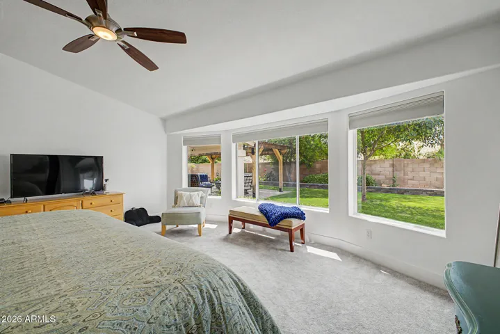 Enjoy peaceful, serene backyard views from a charming bay window sitting area, with no two-story homes behind for added privacy and a more open feel.