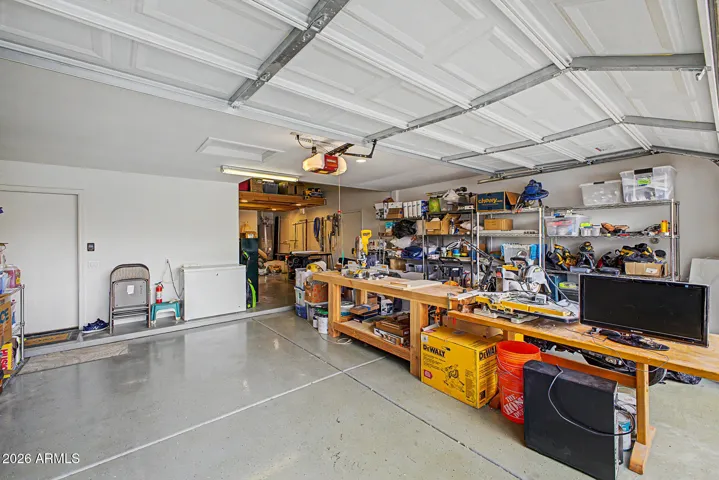 Tandem 2.5 car garage offering exceptional flexibility with room for additional vehicles, storage, bicycles, or a dedicated workshop area.