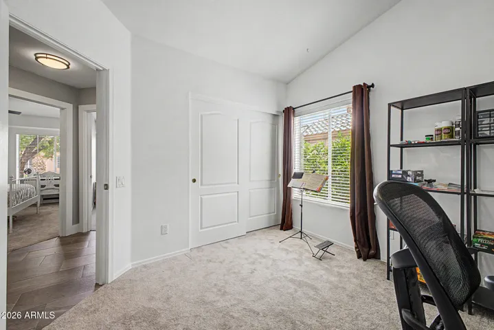 Flexible room with closet, ideal for a bedrooom, guest room, office, or hobby space.