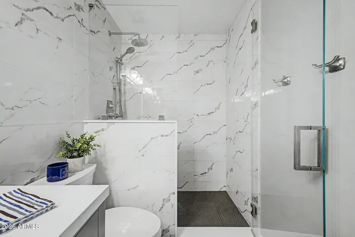 Remodeled in 2019 with a custom tiled walk-in shower and stylish finishes.
