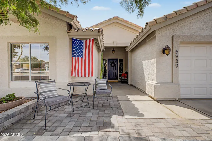 Front paver patio adds extra space to enjoy outdoors.