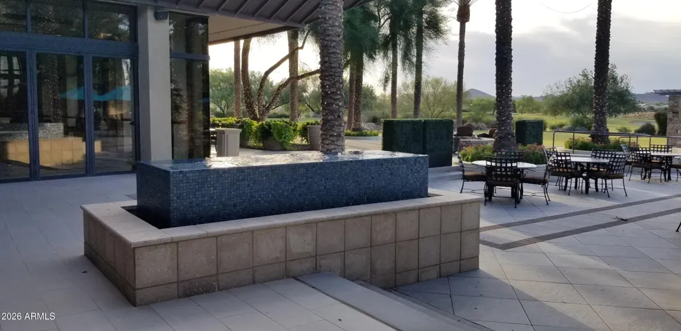 Beautiful outdoor patio overlooks Trilogy Golf Course .