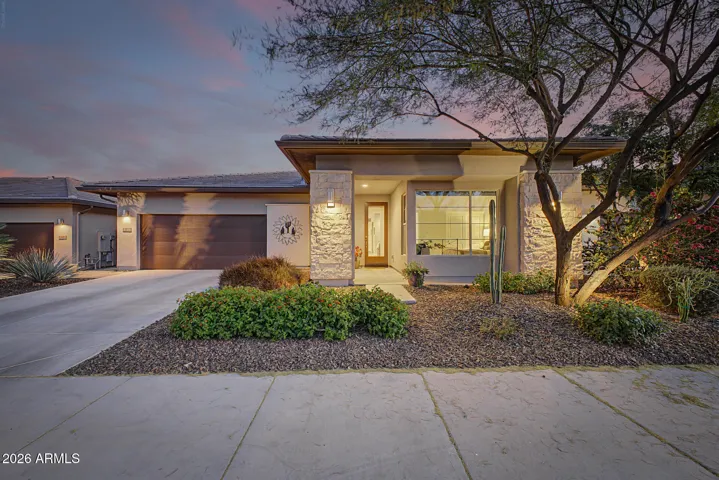 Beautiful stone elevation! Home has stunning curb appeal and shows PRIDE OF OWNERSHIP!