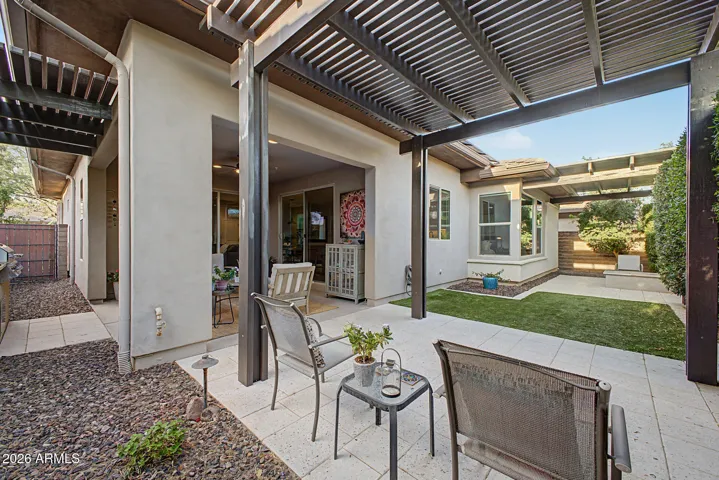 3 pergolas, travertine patios and gas firepit for year round enjoyment!