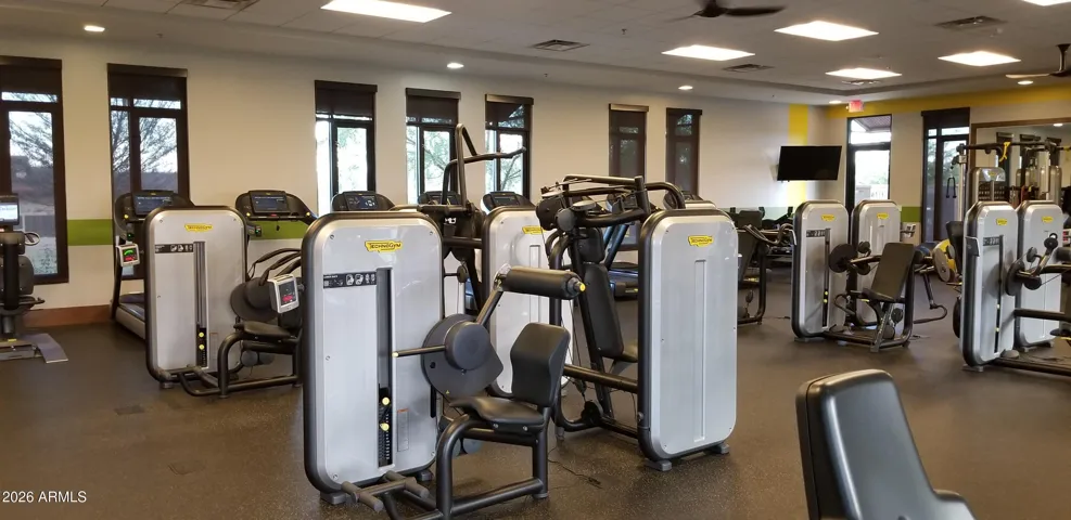 Fitness center with machines and free weights.
