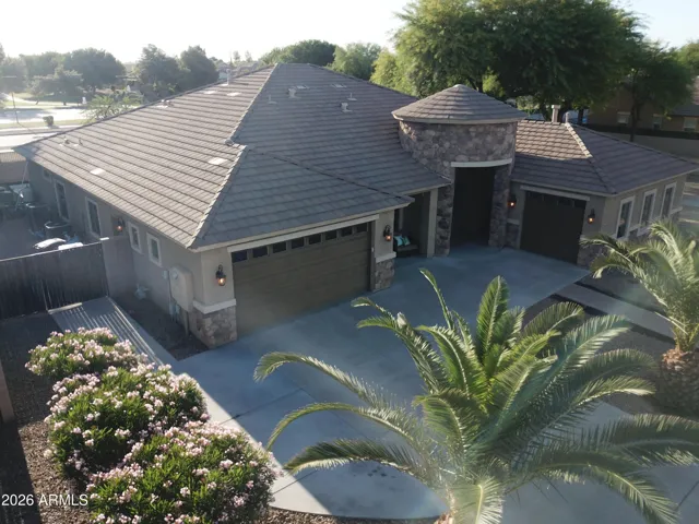 3 car garage and RV gate