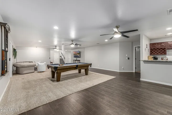 Huge downstairs gathering space with pool table