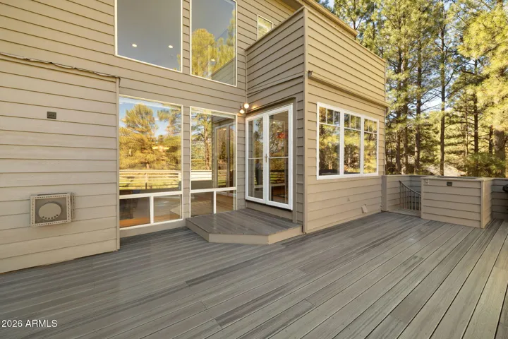 Door from kitchen out to main level trex deck