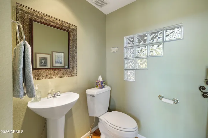 Powder bath off entryway and living room