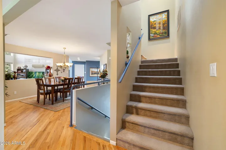 Stairs up to primary bedroom
