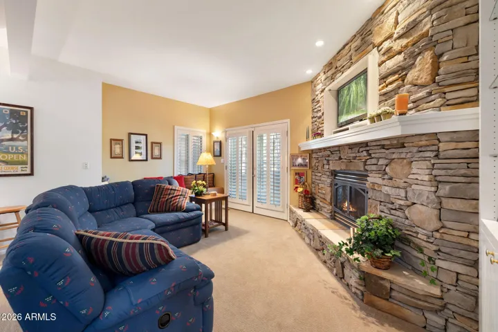 Downstairs family room with fireplace