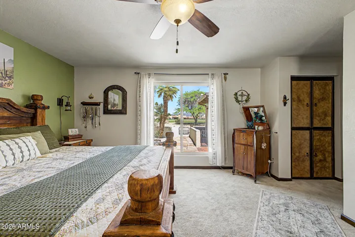 Primary bedroom overlooking the golf course