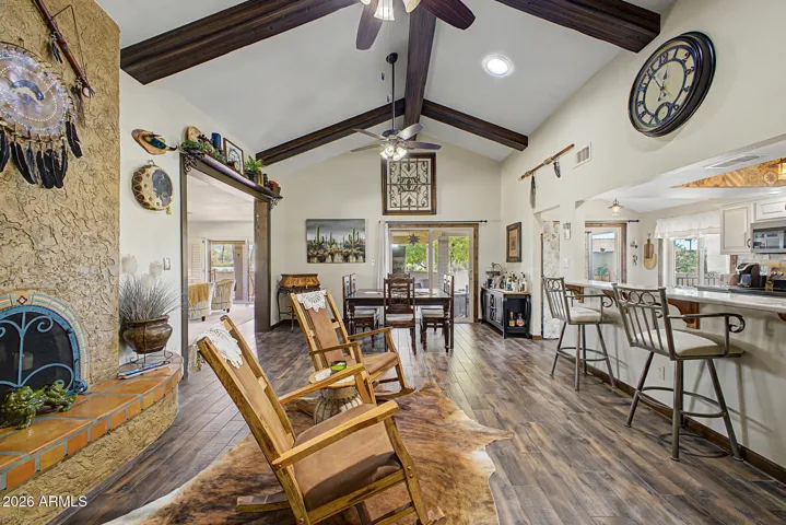 Great room open to the breakfast bar & kitchen