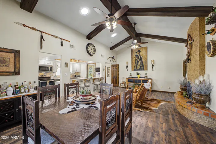 Dining area with wood like tile flooring