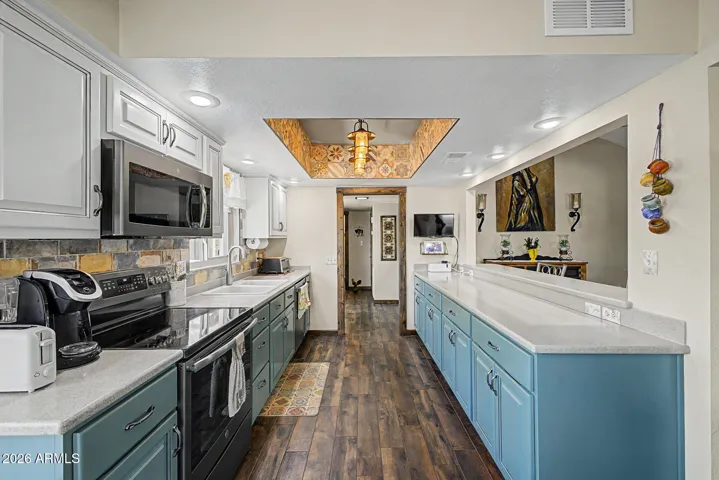Isle kitchen with newer appliancesIsle kitchen