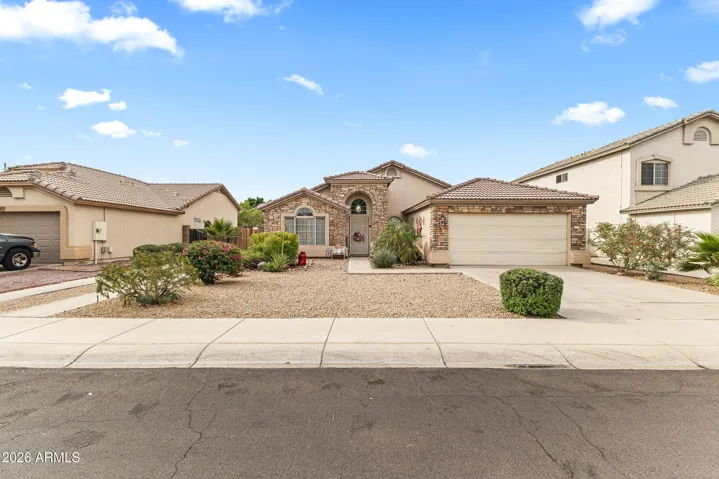 North facing home with great curb appeal. Extra parking and RV gate on the side.