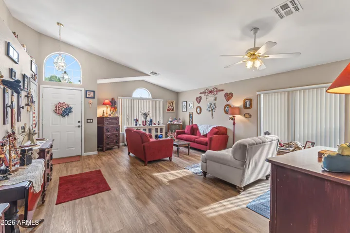 Vaulted ceilings and vinyl plank looring throughout the house.