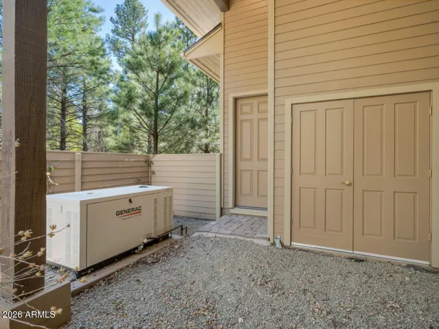 Home equipped with a Generac backup generator system providing added energy efficiency, reliability, and peace of mind year-round in Flagstaff.