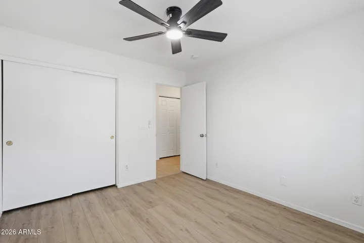New vinyl plank flooring, fresh paint and new ceiling fan