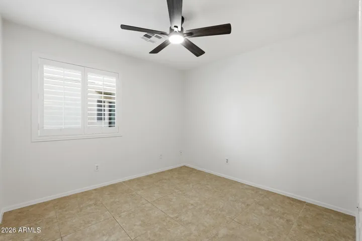 Tile floors, new ceiling fan, fresh paint and shutters