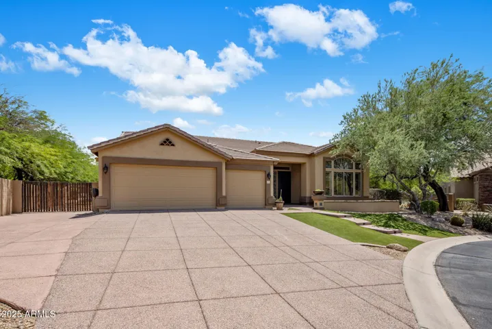 3 car garage, RV gate, and extra parking