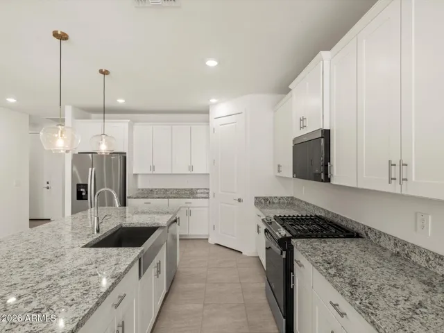 Photo is not of the actual home. Interior finishes and fixtures may vary.