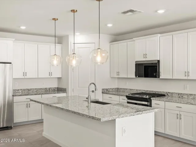 Photo is not of the actual home. Interior finishes and fixtures may vary.