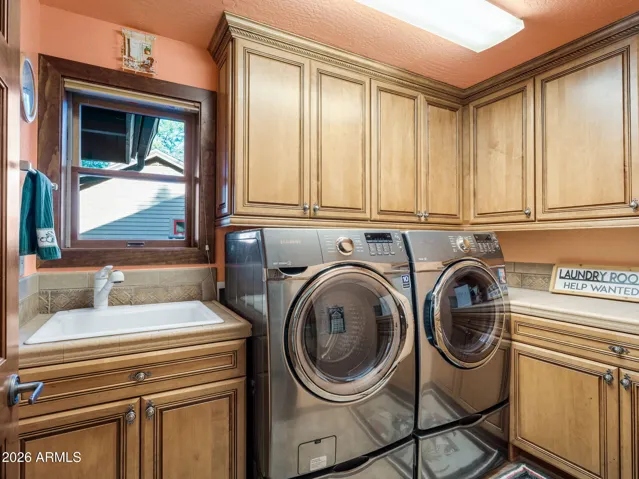 Large Laundry Room with sink and TONS of Cabinets