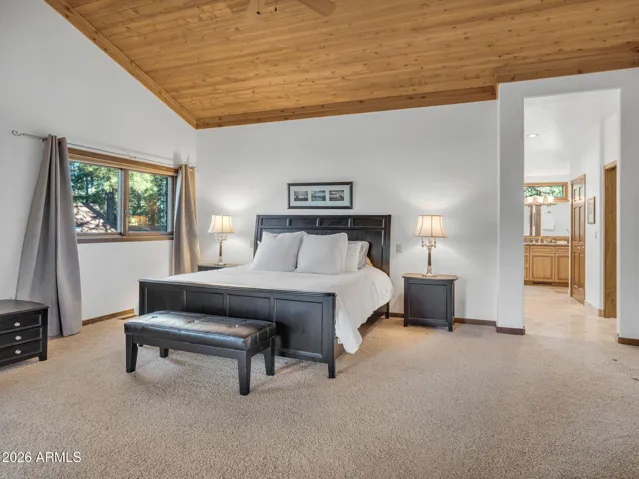 Primary Bedroom with Views of the 12th Hole and Private Balcony