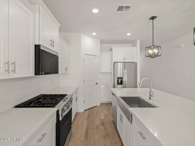 Photo is not of the actual home. Interior finishes and fixtures may vary.