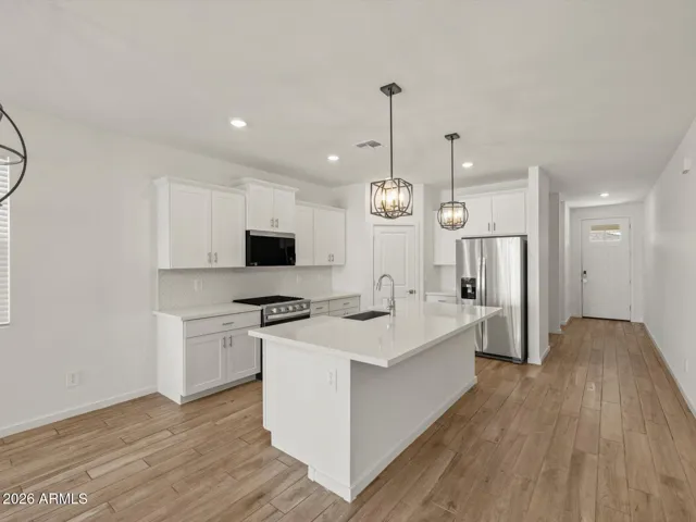 Photo is not of the actual home. Interior finishes and fixtures may vary.