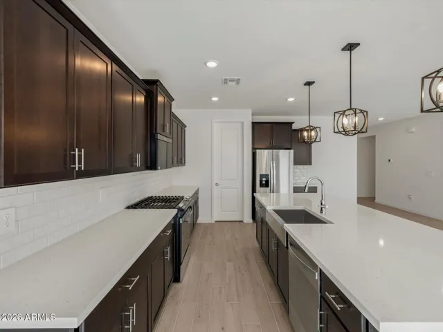 Photo is not of the actual home. Interior finishes and fixtures may vary.