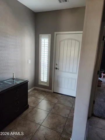 Foyer with bead board door
