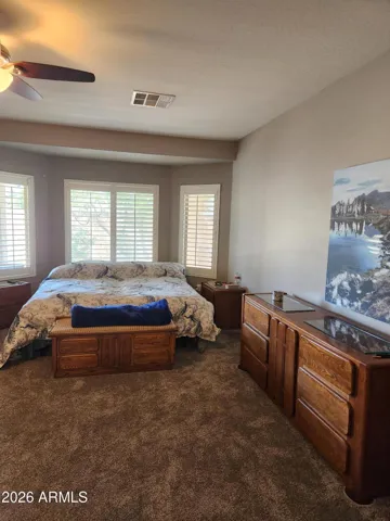 Long view of primary bedroom