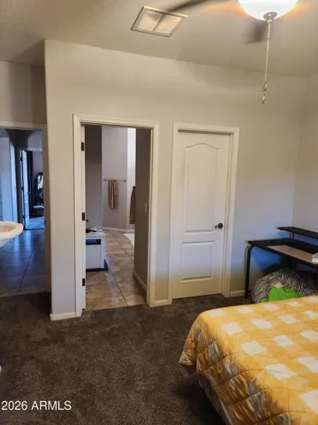 Guest bedroom showing jack-n-jill entrance to 2nd bath