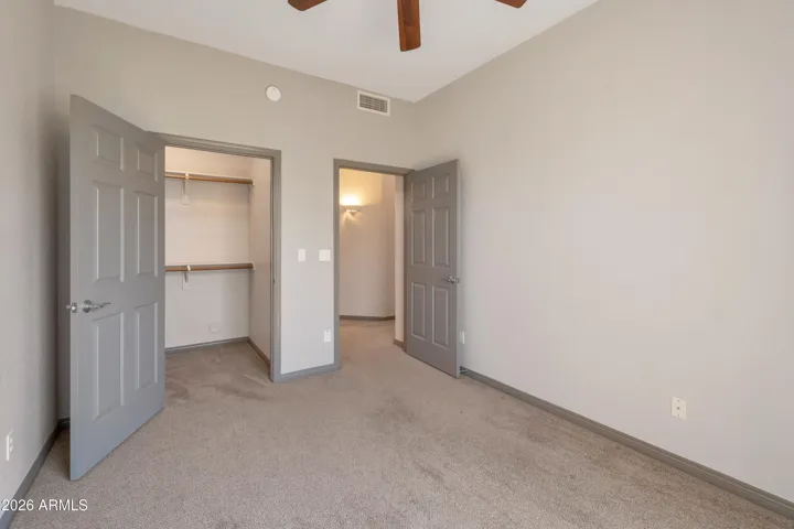 Guest Bedroom with Walk-In Closet