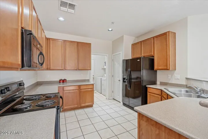 Generous Kitchen w/ Extensive Storage & Prep Areas
