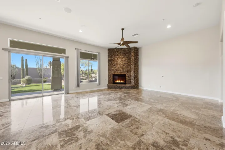 Exits to outdoor oasis from master bedroom, great room| kitchen, and expansive bonus | game room.