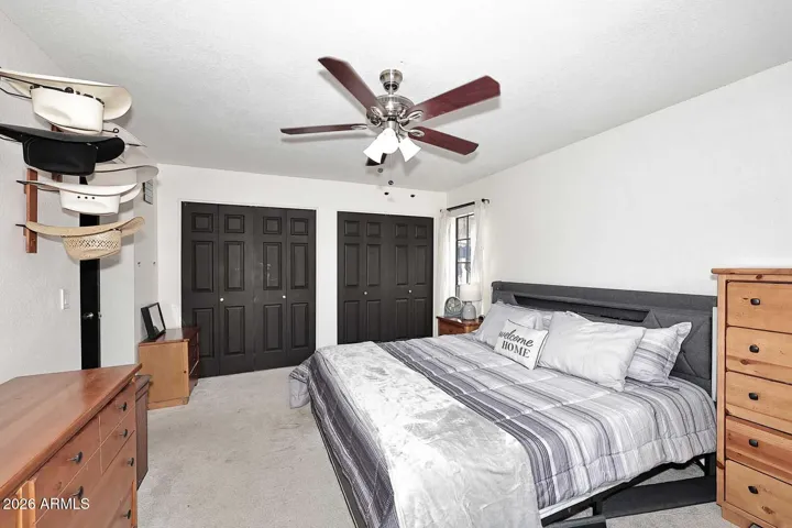 Two closets in primary bedroom