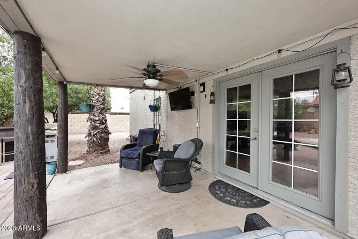 Enjoy watching the game on the TV from the covered patio