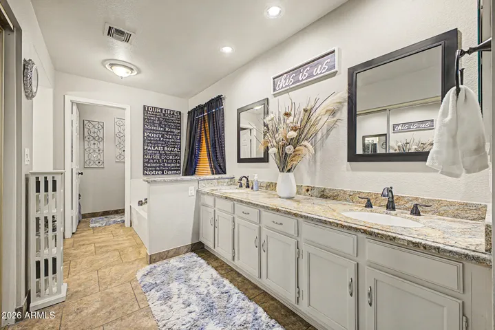 Primary bathroom with private toilet room