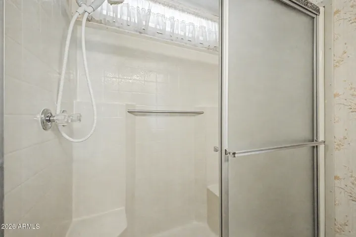 Low step over shower
