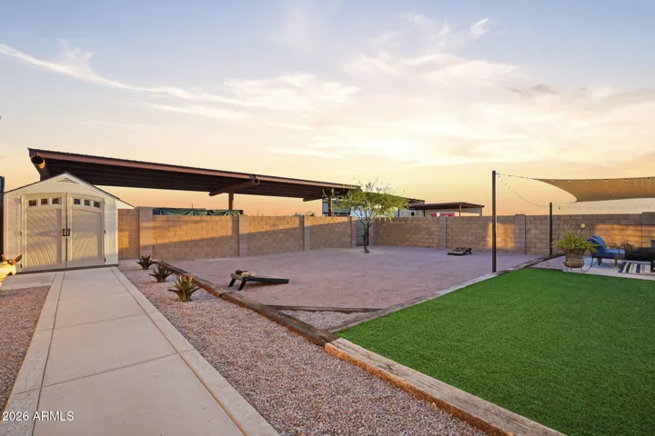 Expansive Backyard with Multiple Entertaining Areas