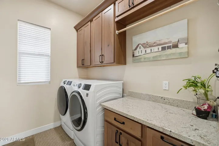 Laundry Room w/ Granite Countertops & Hickory Cabinets