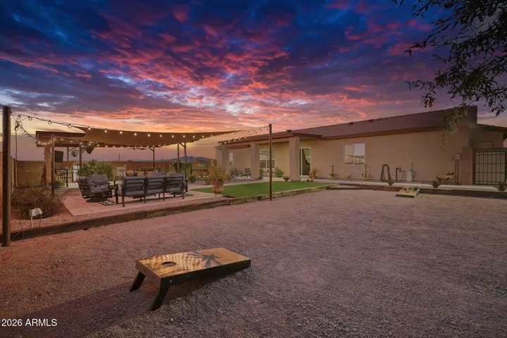 Expansive Backyard with Multiple Entertaining Areas
