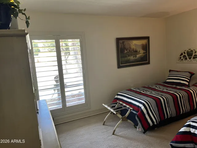 Secondary bedroom with shutters
