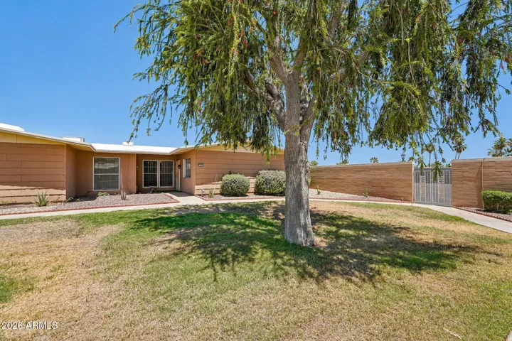 End Unit with Grass Courtyard & Shade Tree