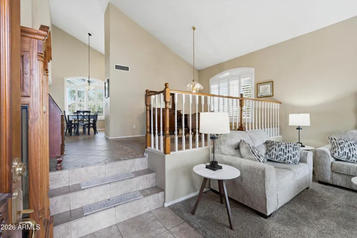 Up steps to dining and kitchen areas.