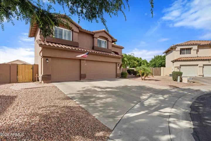 Great deep driveway with side gate access & 3 car garage.