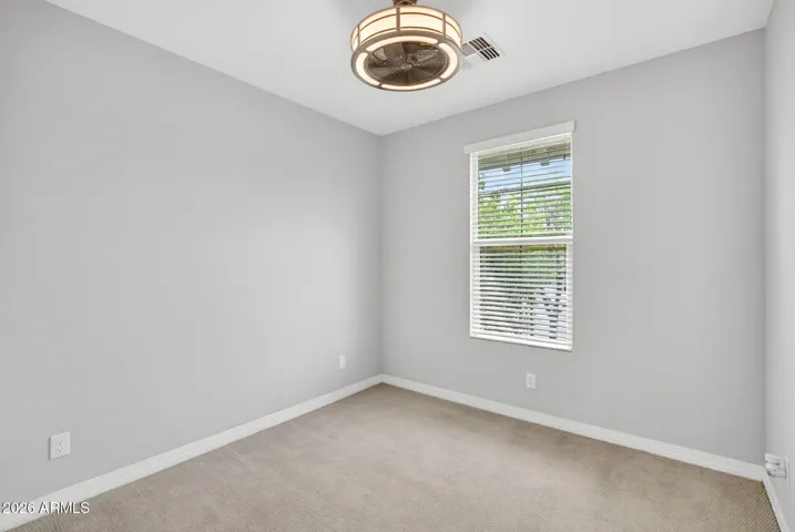 The second bedroom is split from primary, and with the jack n jill, makes the perfect ensuite guest quarters